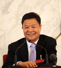 答周以农